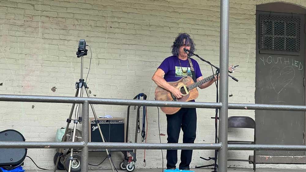 person playing guitar