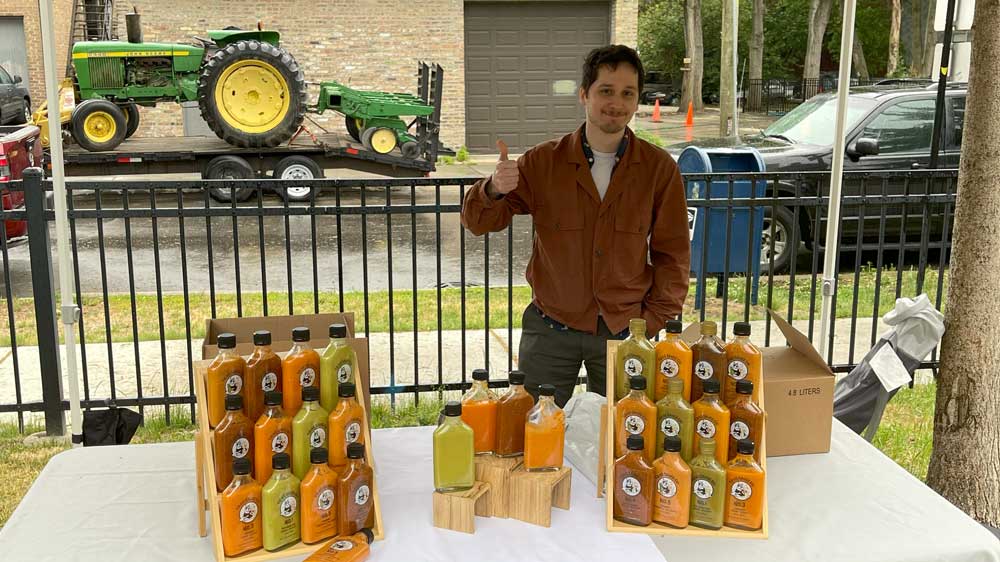 vendor selling hot sauces